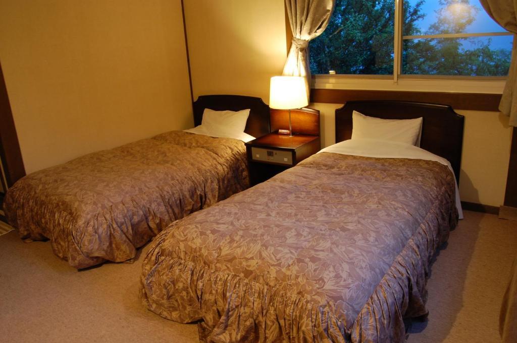 Petit Hotel Alumu Matsumoto Habitación foto